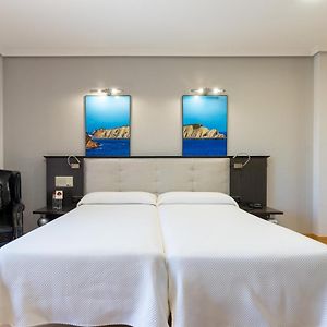 Habitación Estándar con 2 Camas Individuales